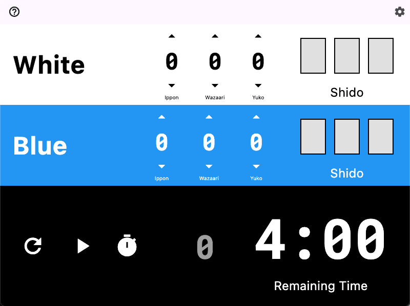 IpponBoard judo scoreboard showing White vs Blue with Ippon and Waza-ari scoring during a tournament shiai